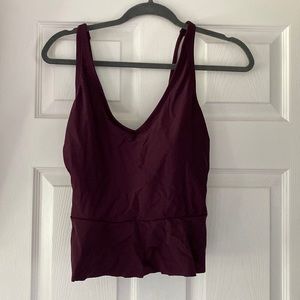 Never worn peplum style bathing suit top
